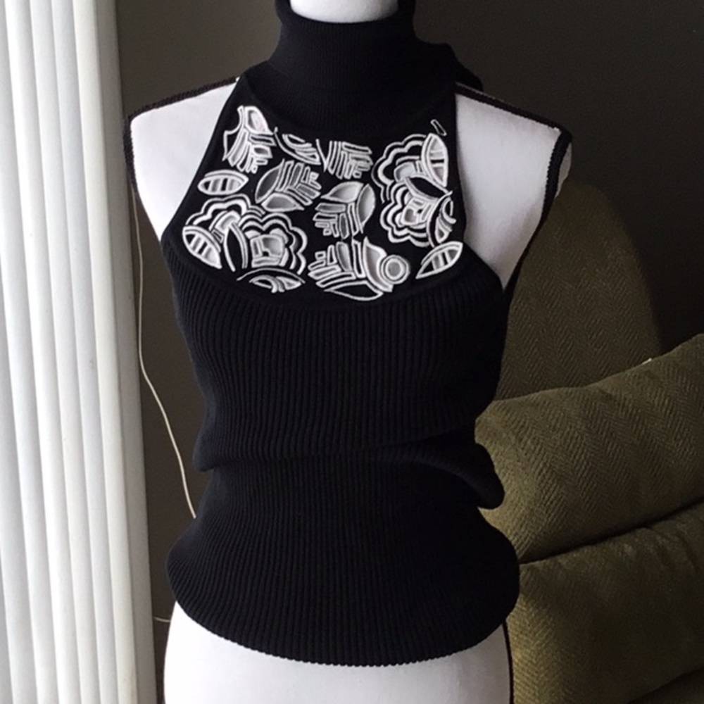 Black Sleeveless Top with White Floral Design